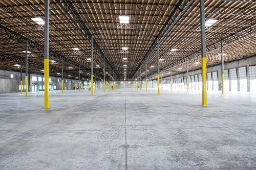 wide angle interior view of largeempty warehouse a 2023 11 27 04 50 33 utc